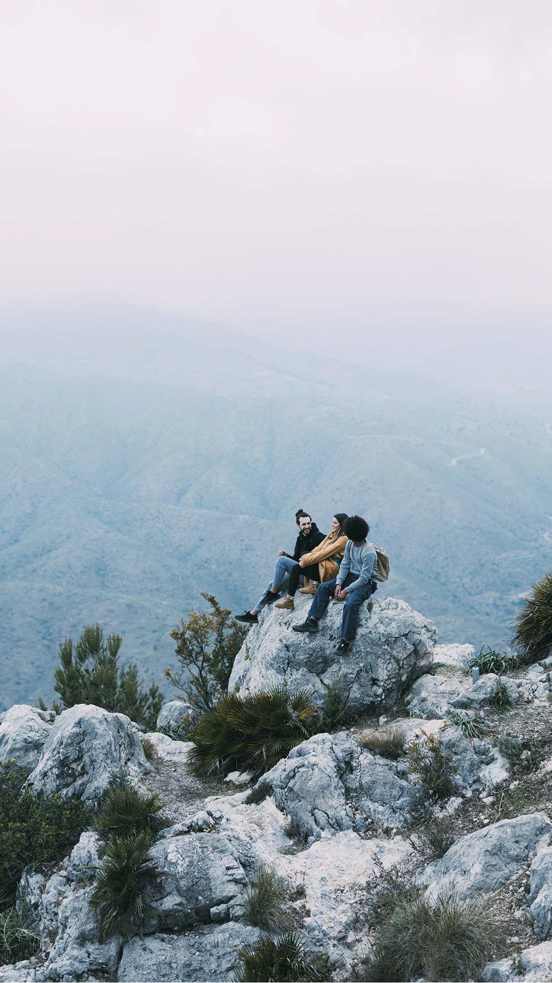 Group of people sitting in nature